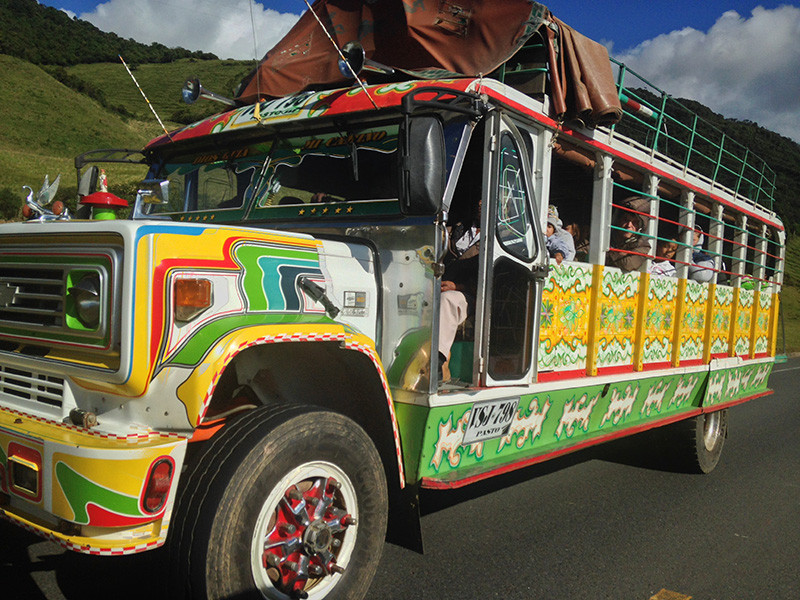 … and we would love to travel onboard one of the colorful ‘chiva’ public buses, but they are too slow for us…