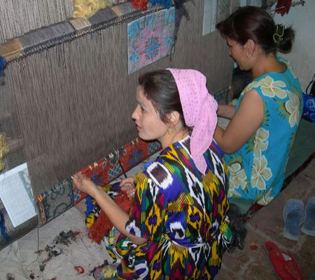 ...and perhaps  local woman weaving one of the famous silk and wool Bukharan rugs.