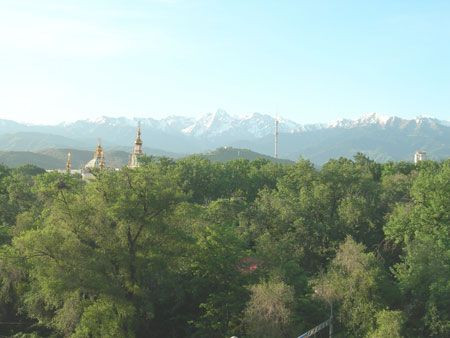 Back in Almaty, the view from the hotel window reveals our final destination &ndash; the Tien Shan Mountains...